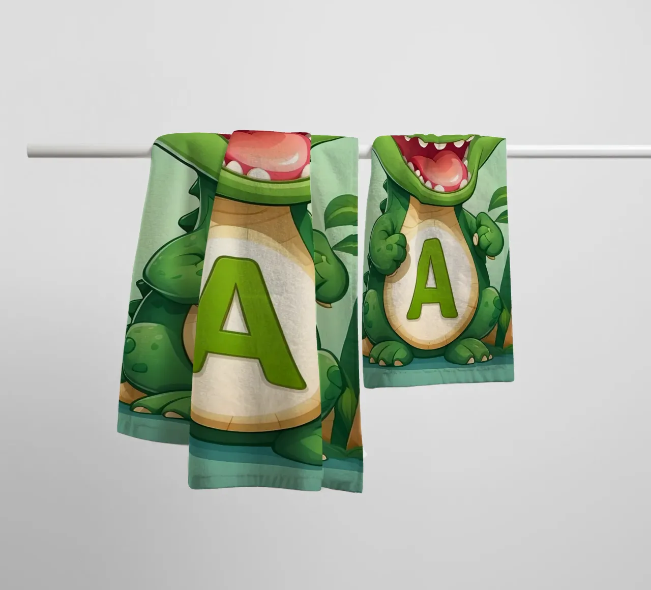 Un allegro alligatore dei cartoni animati si trova accanto a una grande lettera A asciugamano da bagno da DesignDoodle