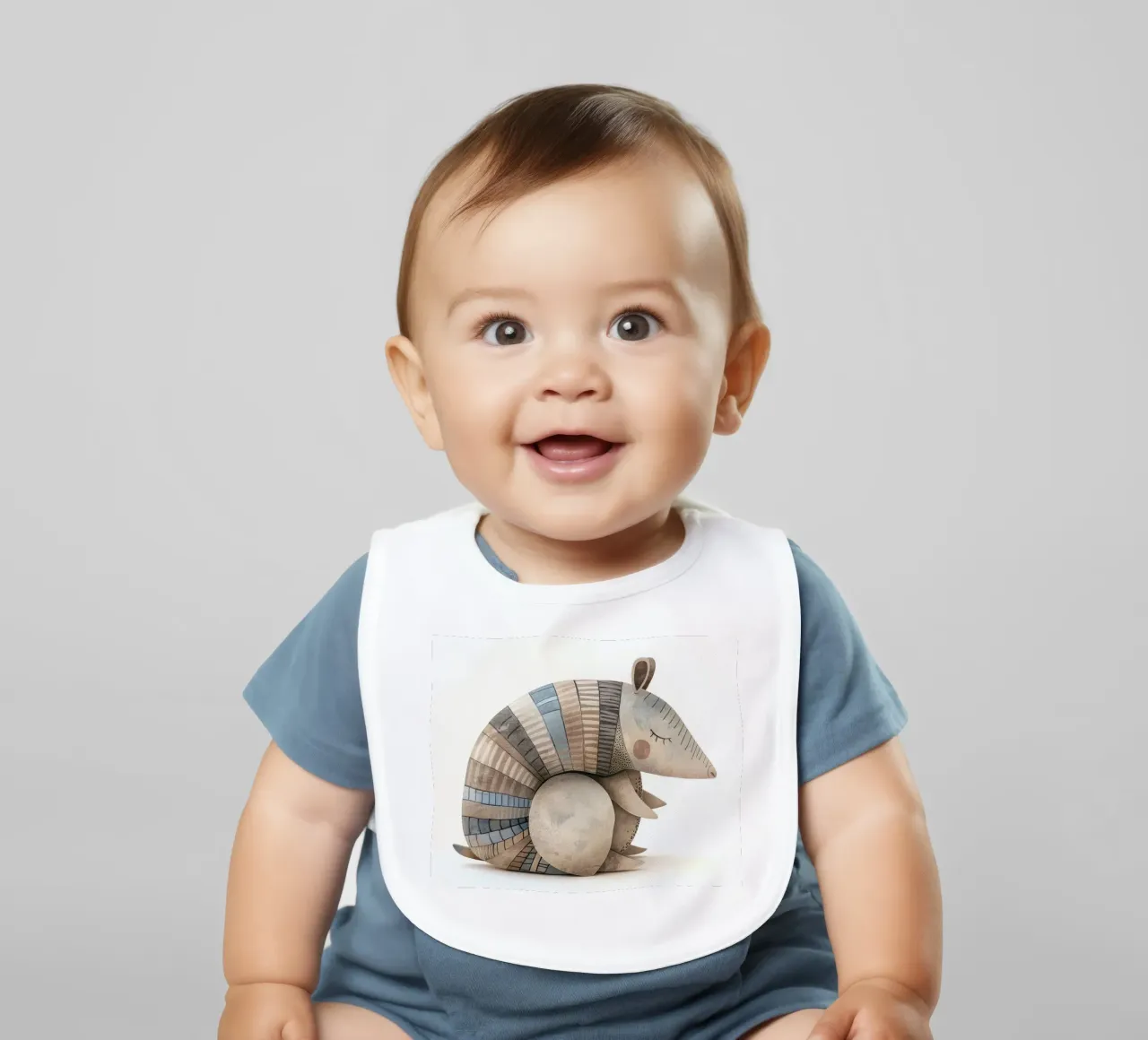 Ceramic Armadillo Figurine with Segmented Shell Pattern baby bib by DesignDoodle