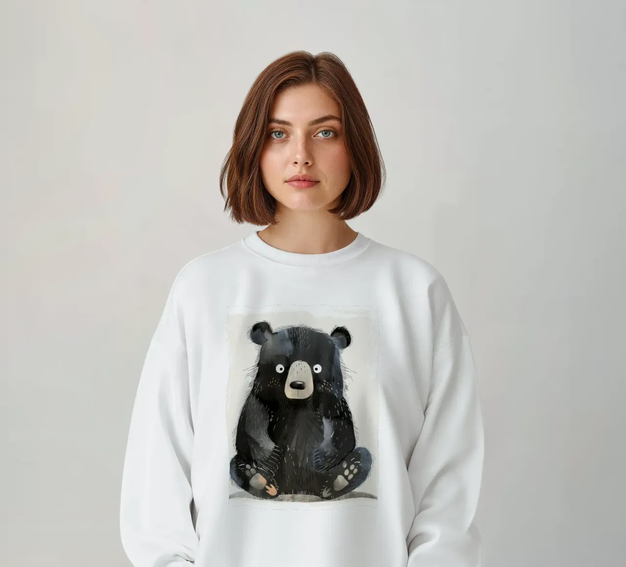 Illustrazione di un cucciolo di orso nero seduto felpa da DesignDoodle