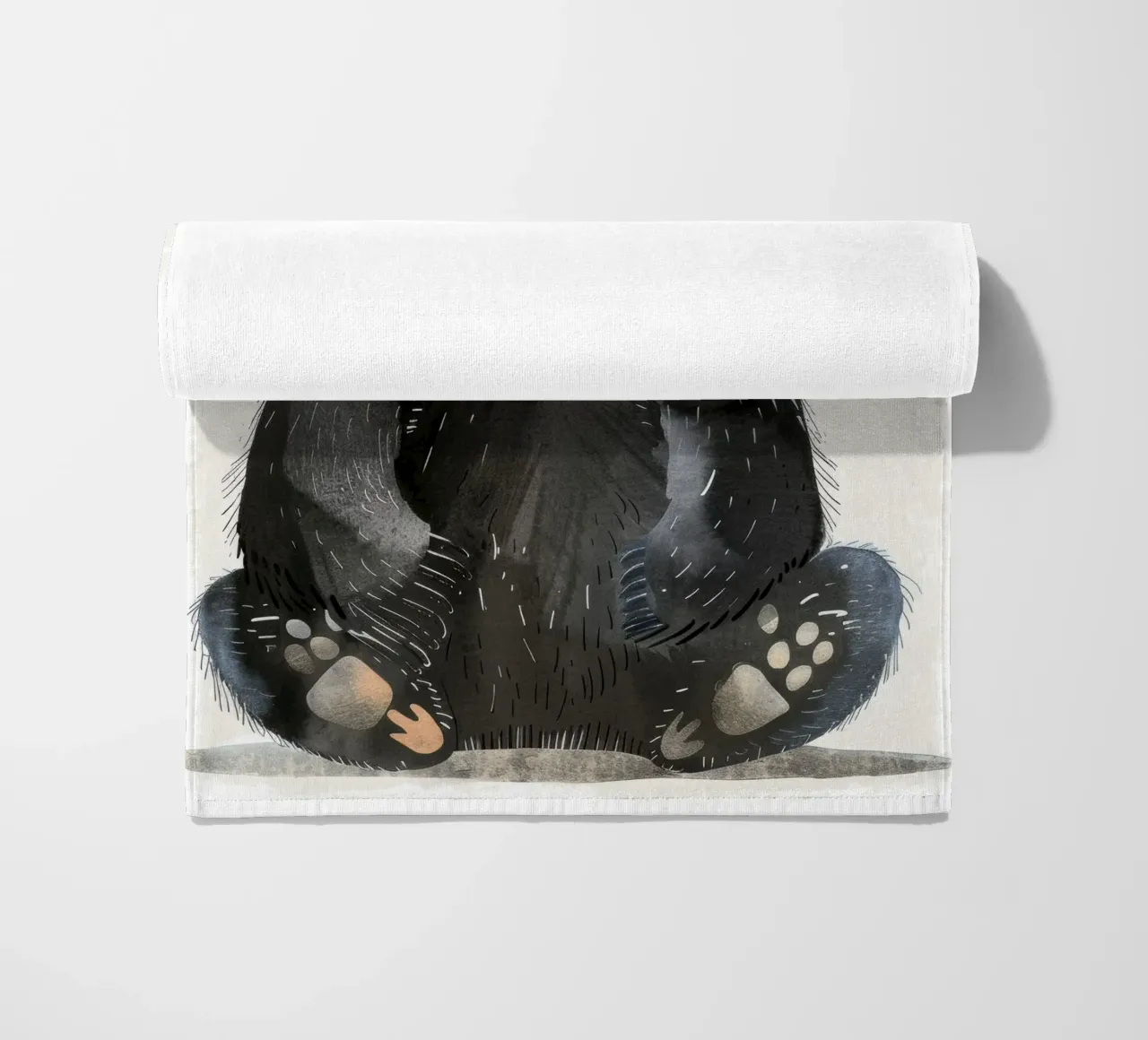 Illustrazione di un cucciolo di orso nero seduto telo mare da DesignDoodle