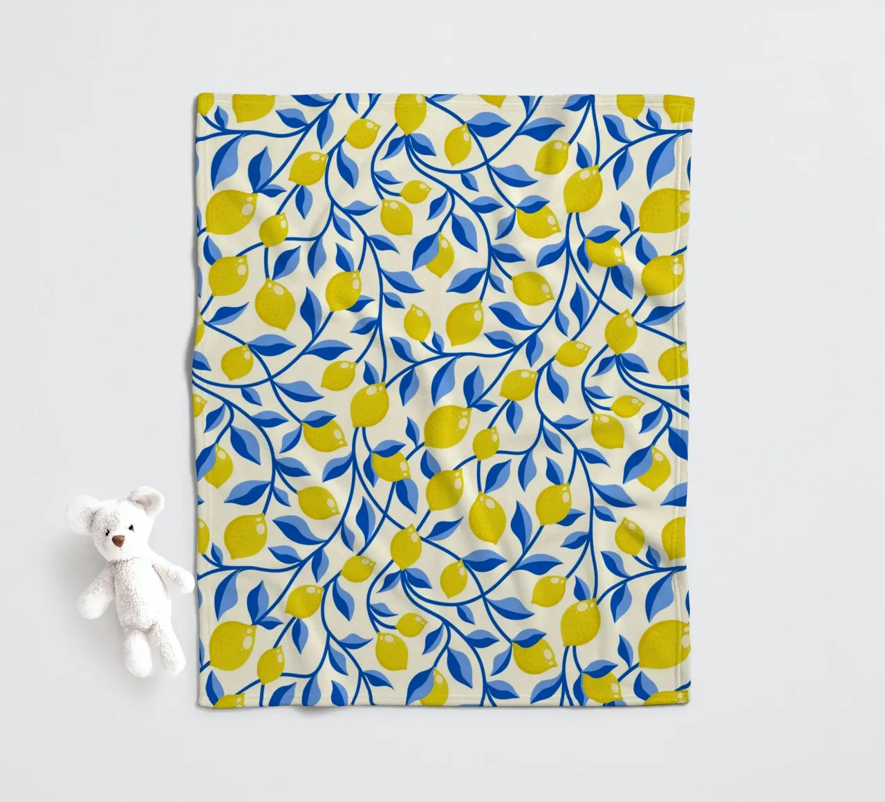 Limoni gialli e foglie blu su crema coperta in pile da CoelfenArt
