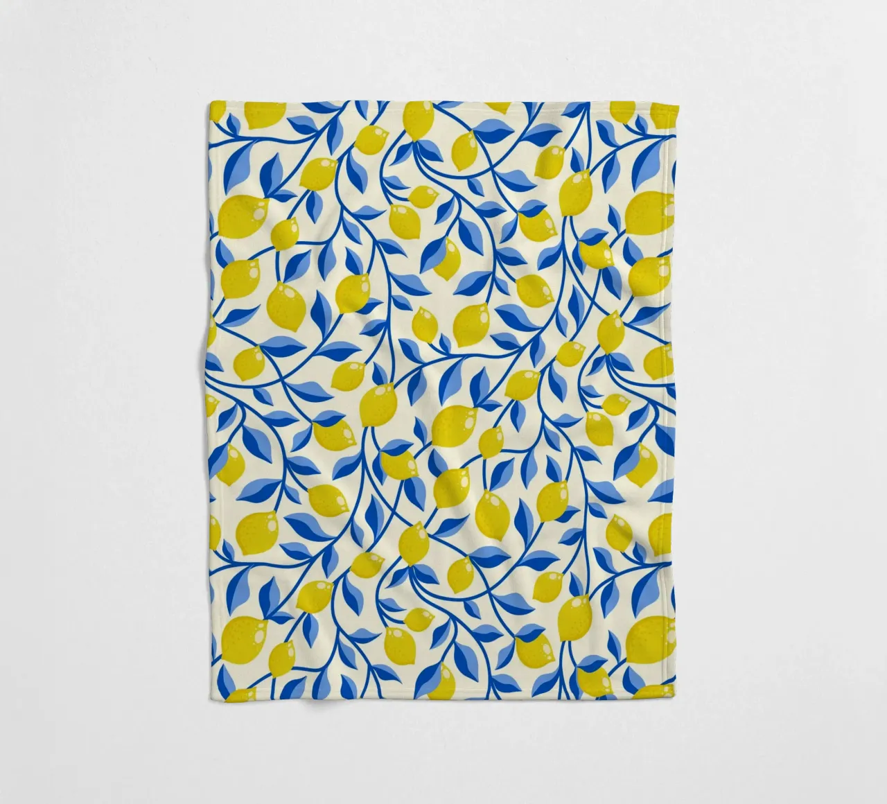 Limoni gialli e foglie blu su crema coperta in pile da CoelfenArt
