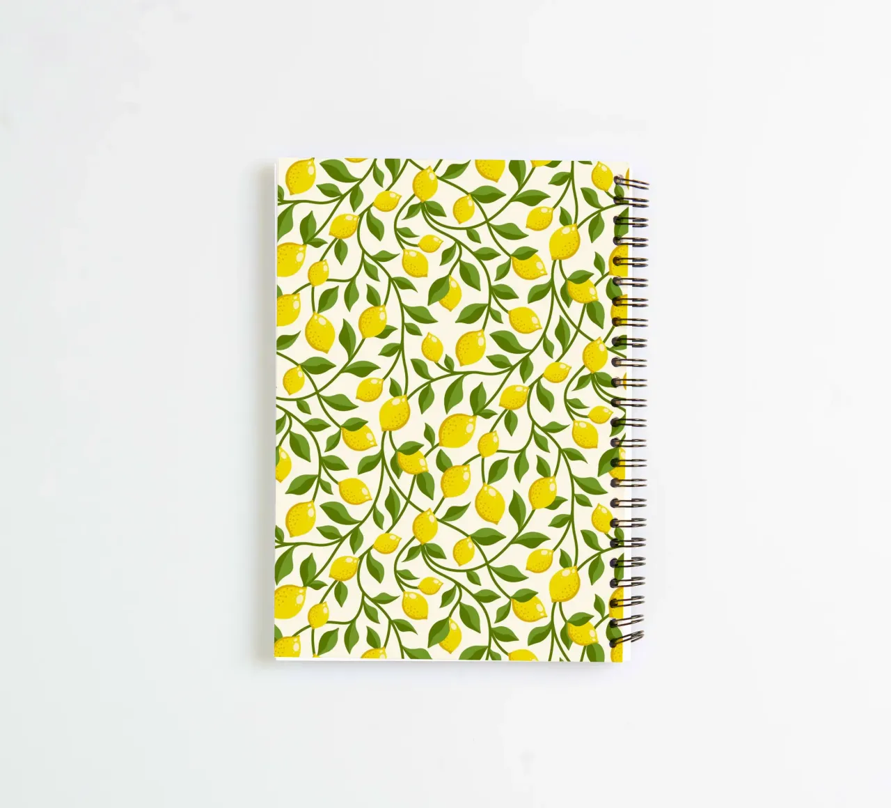 Yellow Lemons and Green trailing Leaves on Cream spiral notebook by CoelfenArt