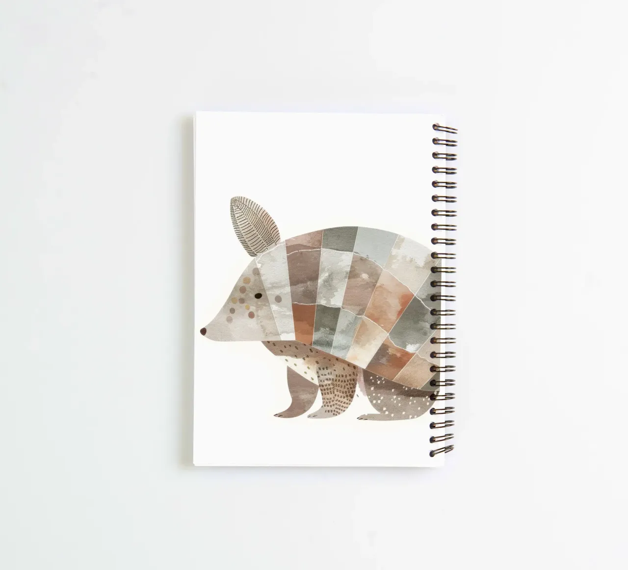 Stylized Armadillo Illustration in Earthy Tones spiral notebook by DesignDoodle