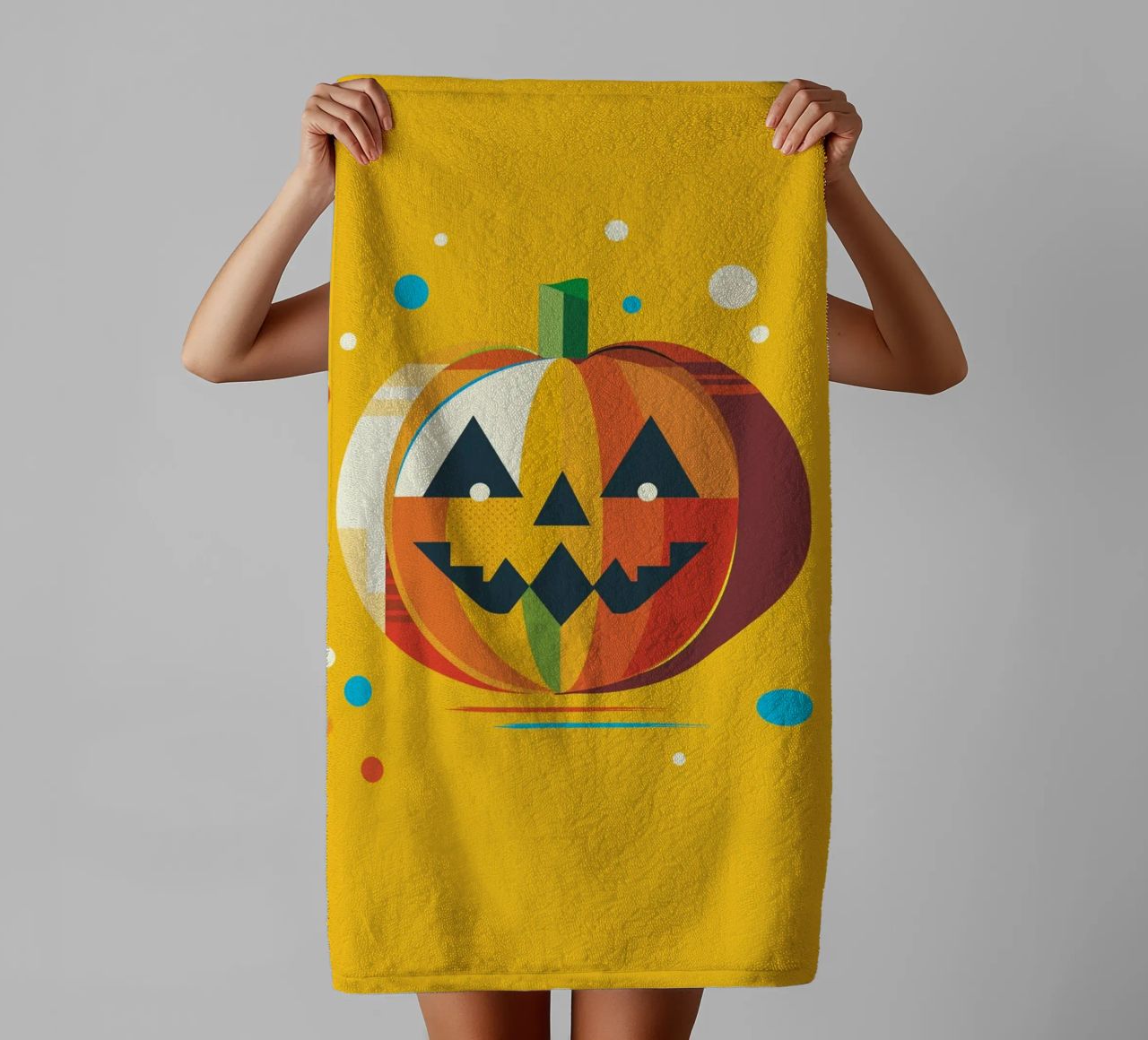 Zucca di Halloween geometrica e colorata con un viso allegro asciugamano da bagno da namosh