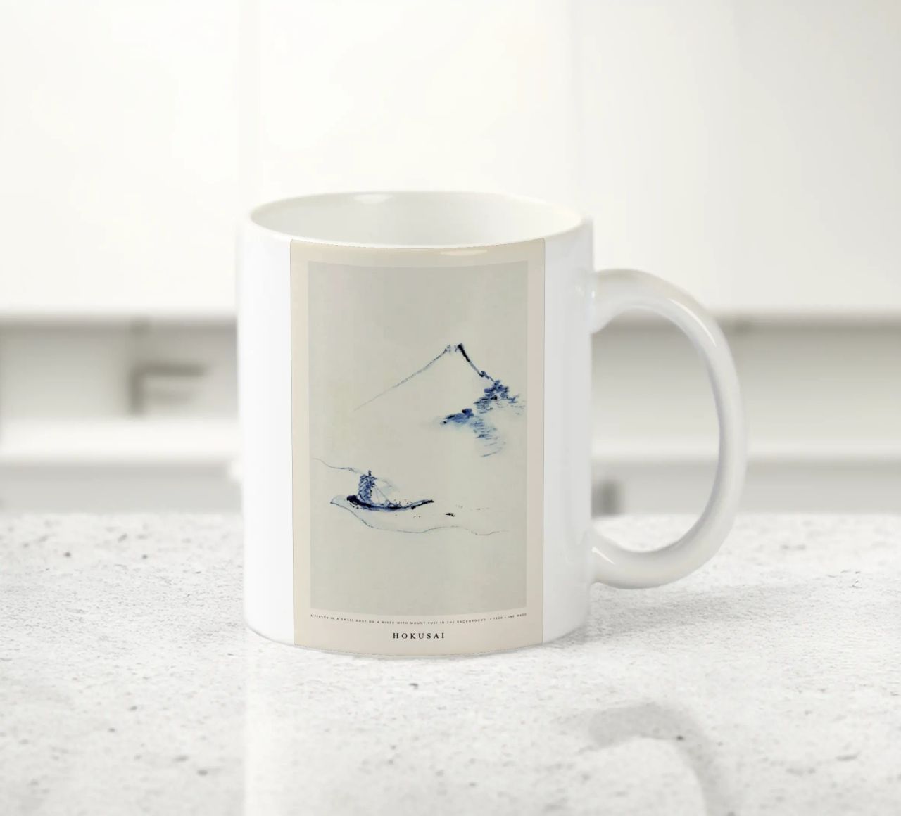Hokusai - A Person in a Small Boat on a River with Mount Fuji in the Background tazza in ceramica da Vintage by JUNIQE