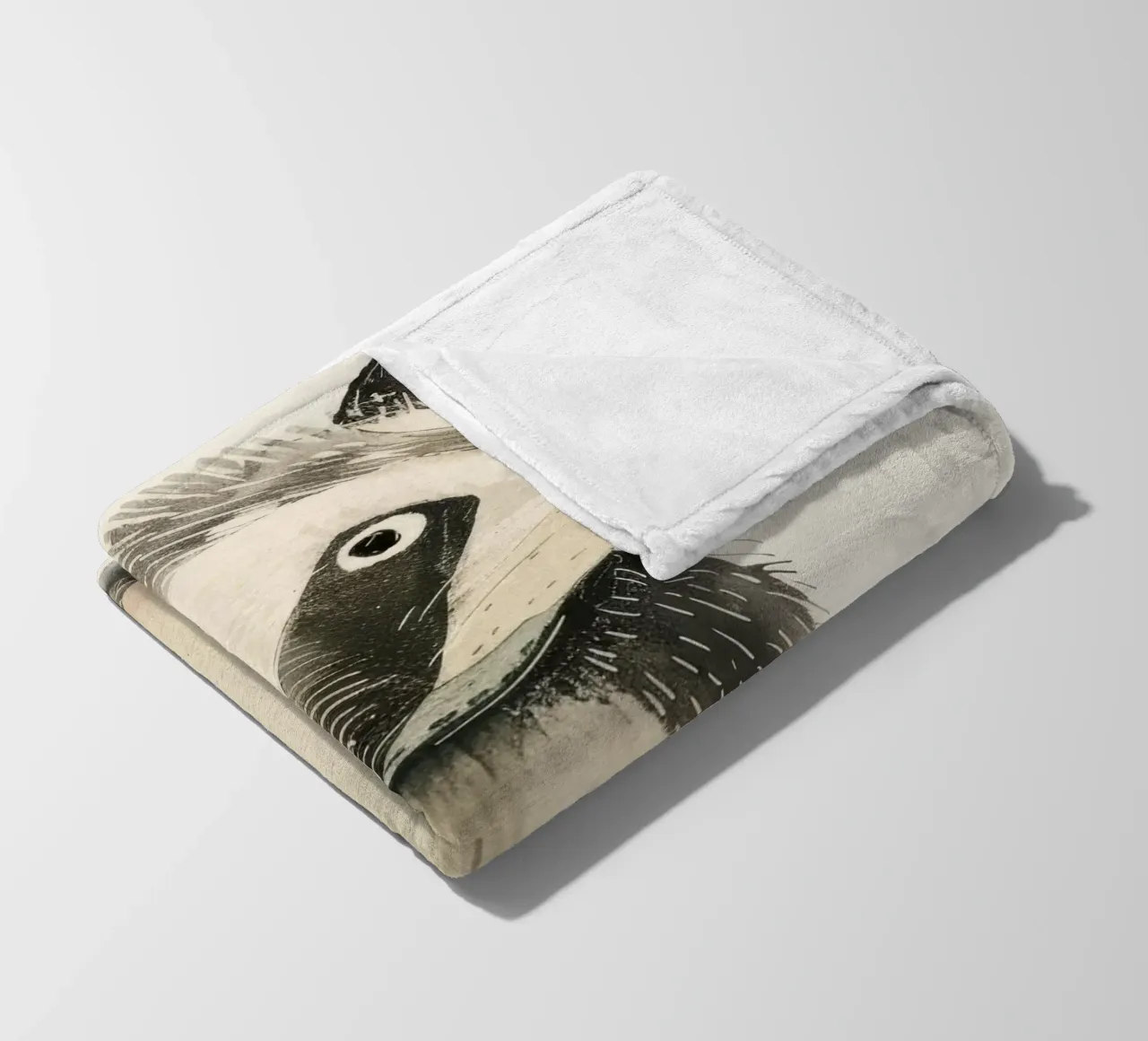 Illustrazione ad acquerello di un procione coperta in pile da DesignDoodle
