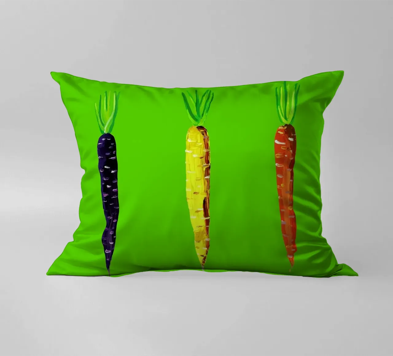 Carrots On Lime Green cuscino da Alice Straker