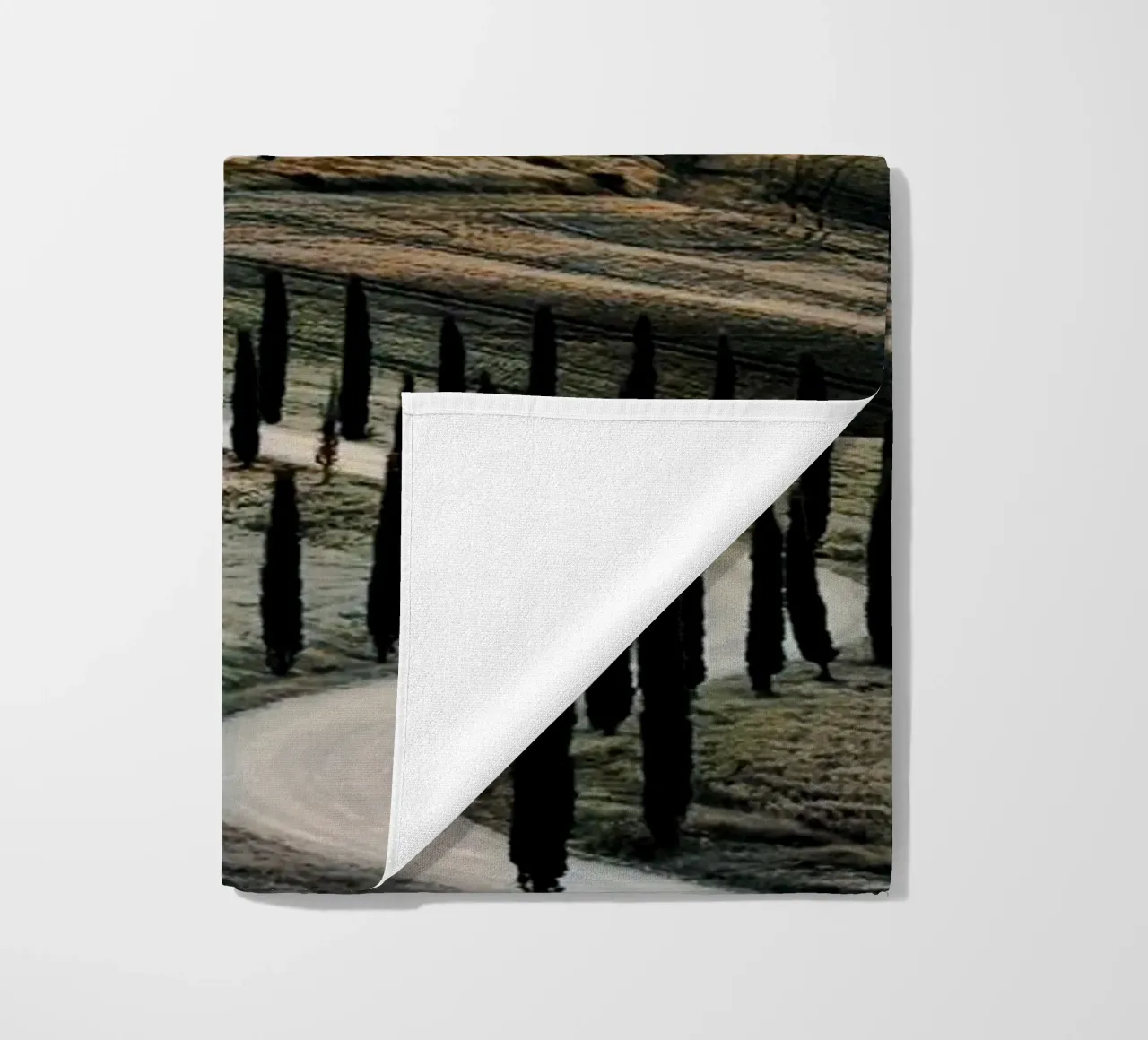 winding road on the hill beach towel by rapunsell