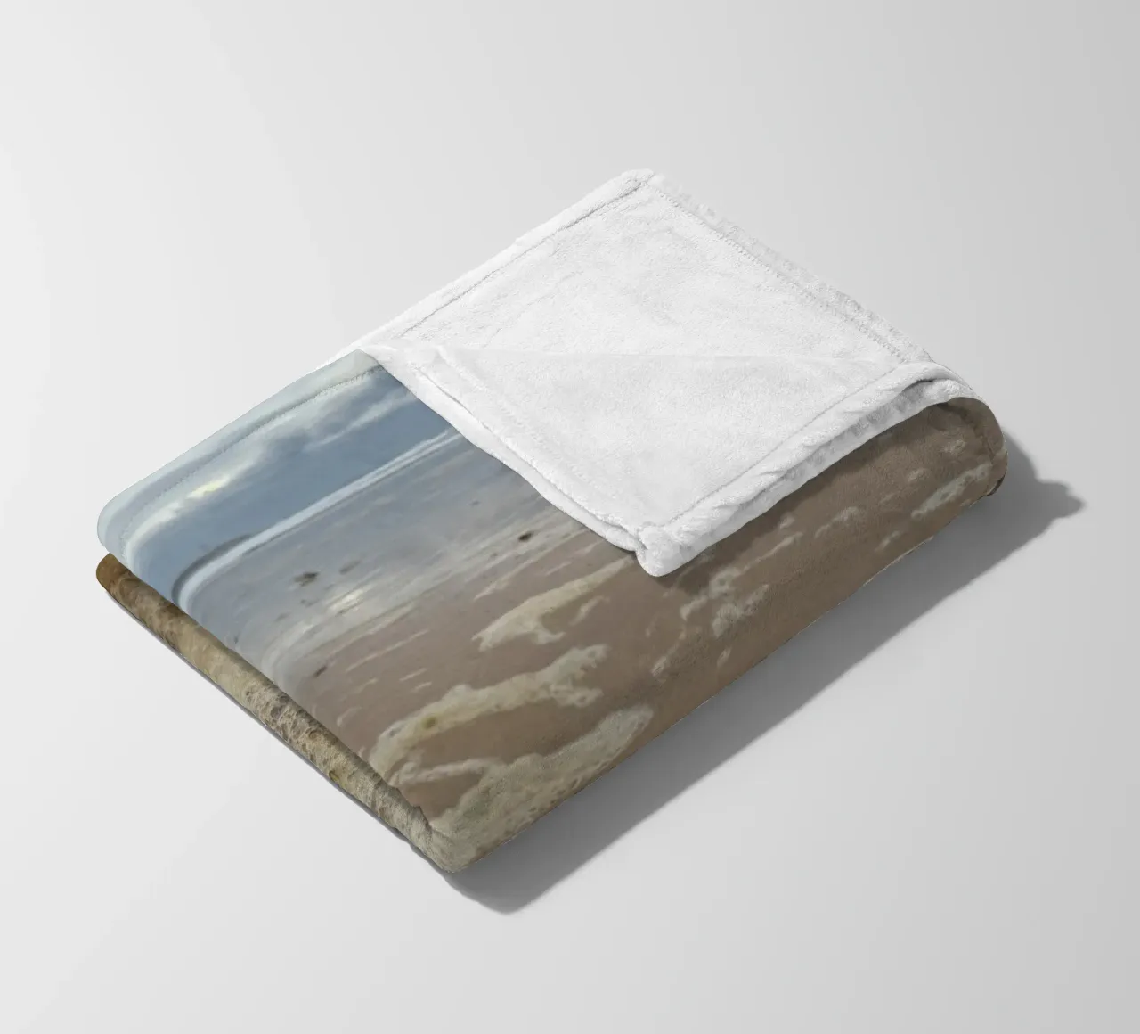 Foam Bubbles under a Cloudy sky at the Beach fleece blanket by byrieneke