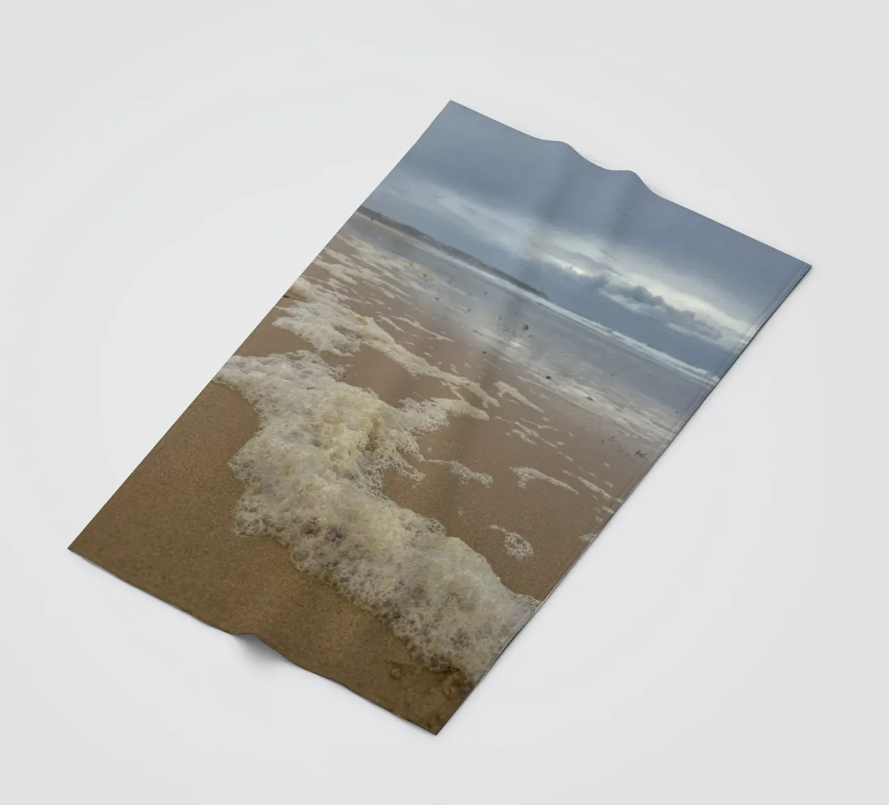 Foam Bubbles under a Cloudy sky at the Beach fleece blanket by byrieneke