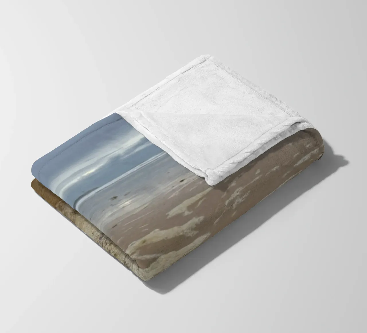 Foam Bubbles under a Cloudy sky at the Beach fleece blanket by byrieneke