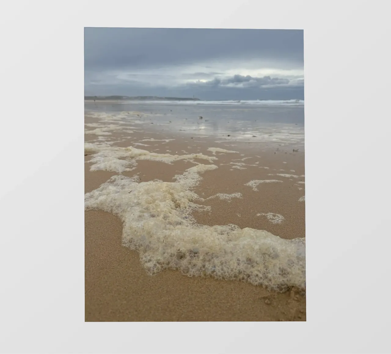 Foam Bubbles under a Cloudy sky at the Beach backlit film by byrieneke