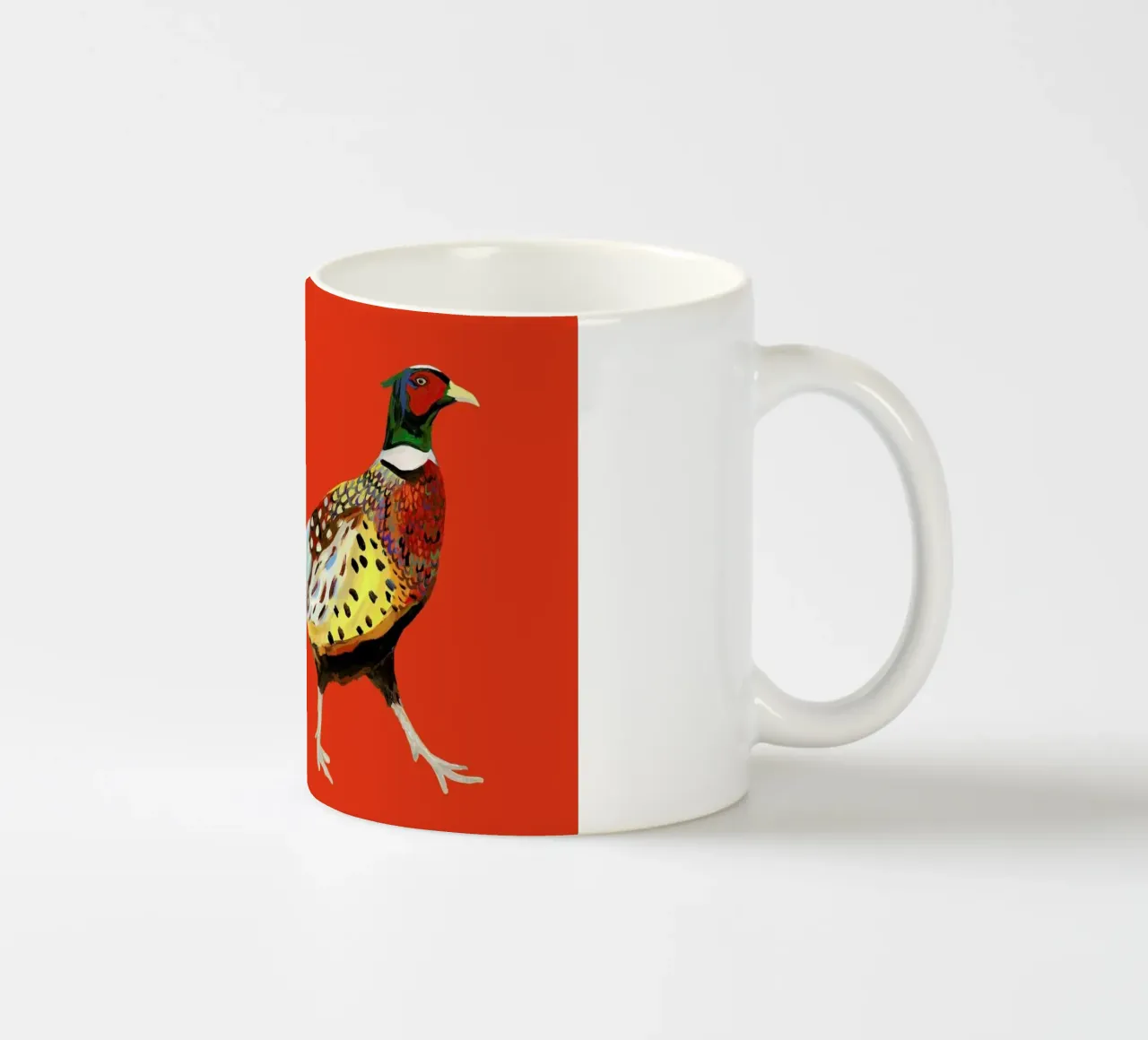 Strutting Pheasant On Orange tazza in ceramica da Alice Straker