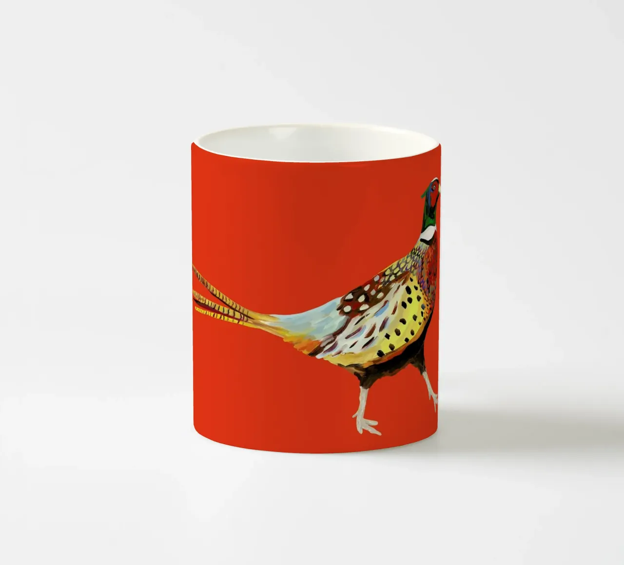 Strutting Pheasant On Orange tazza in ceramica da Alice Straker
