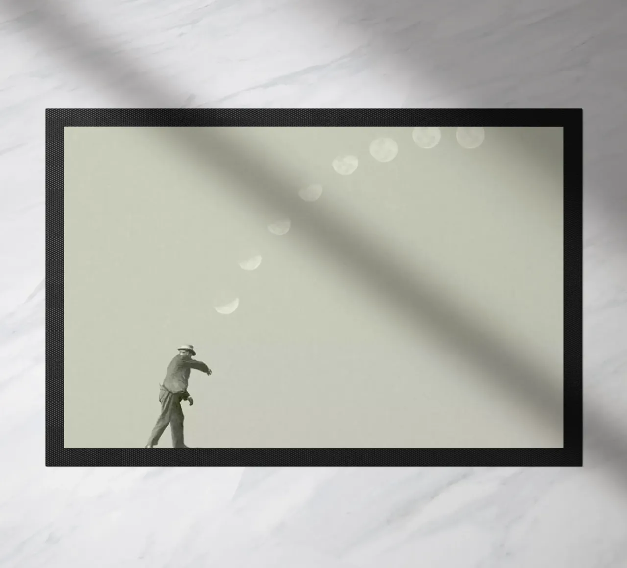 Moon Cycle doormat by Maarten Léon