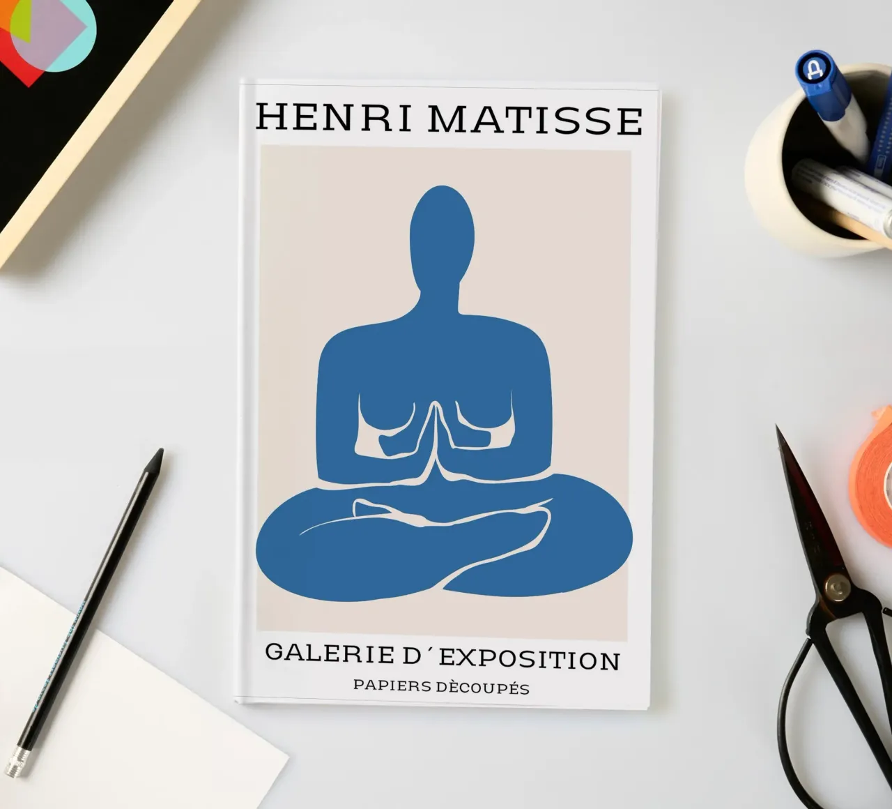 silhoutte of a figure in a meditation position notebook by sazkia art