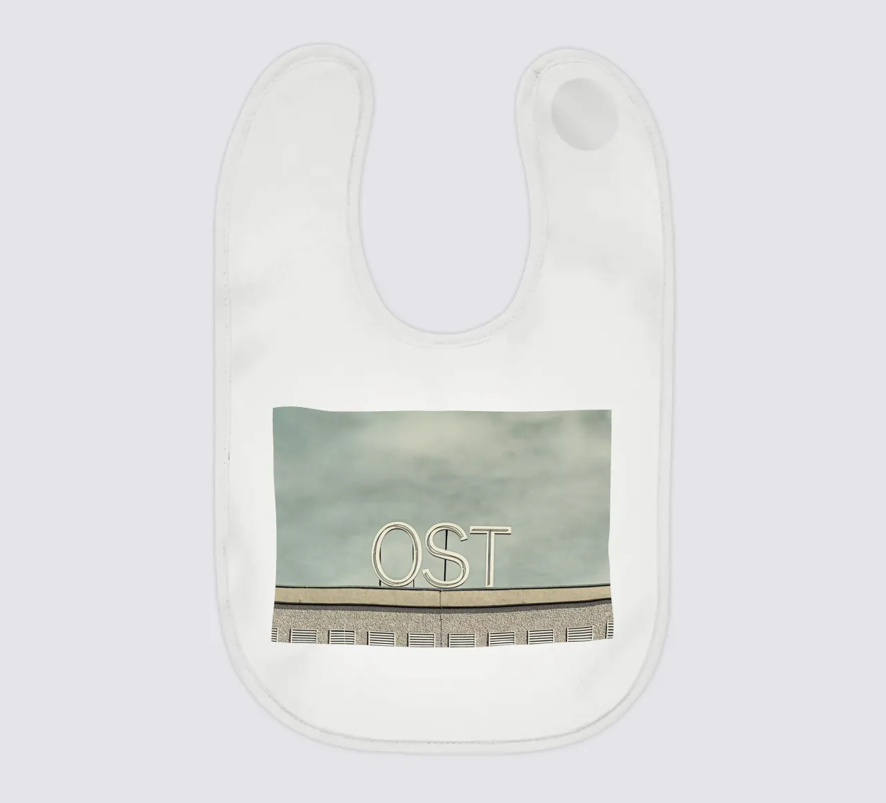 Ost baby bib by Michael Belhadi