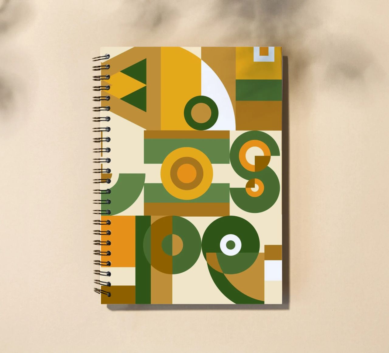 Motif géométrique vert et jaune carnet à spirale de Little Dean