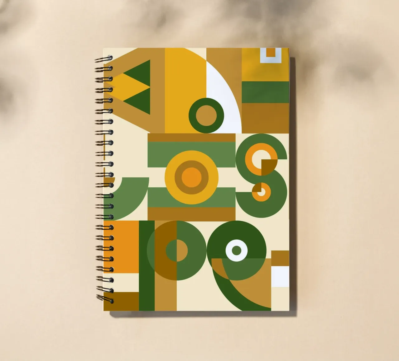 Motif géométrique vert et jaune carnet à spirale de Little Dean