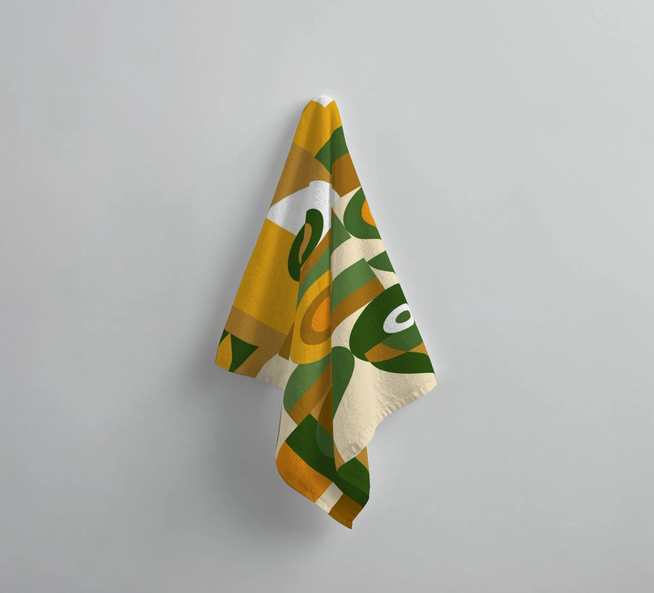Motif géométrique vert et jaune serviette de bain de Little Dean