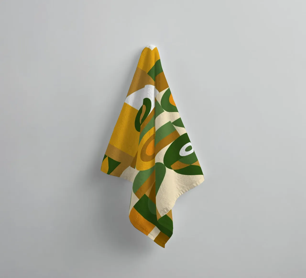 Motif géométrique vert et jaune serviette de bain de Little Dean