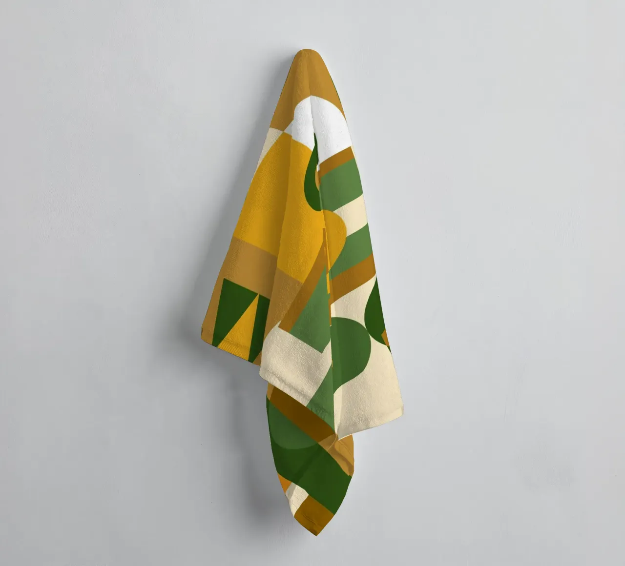 Motif géométrique vert et jaune serviette de bain de Little Dean