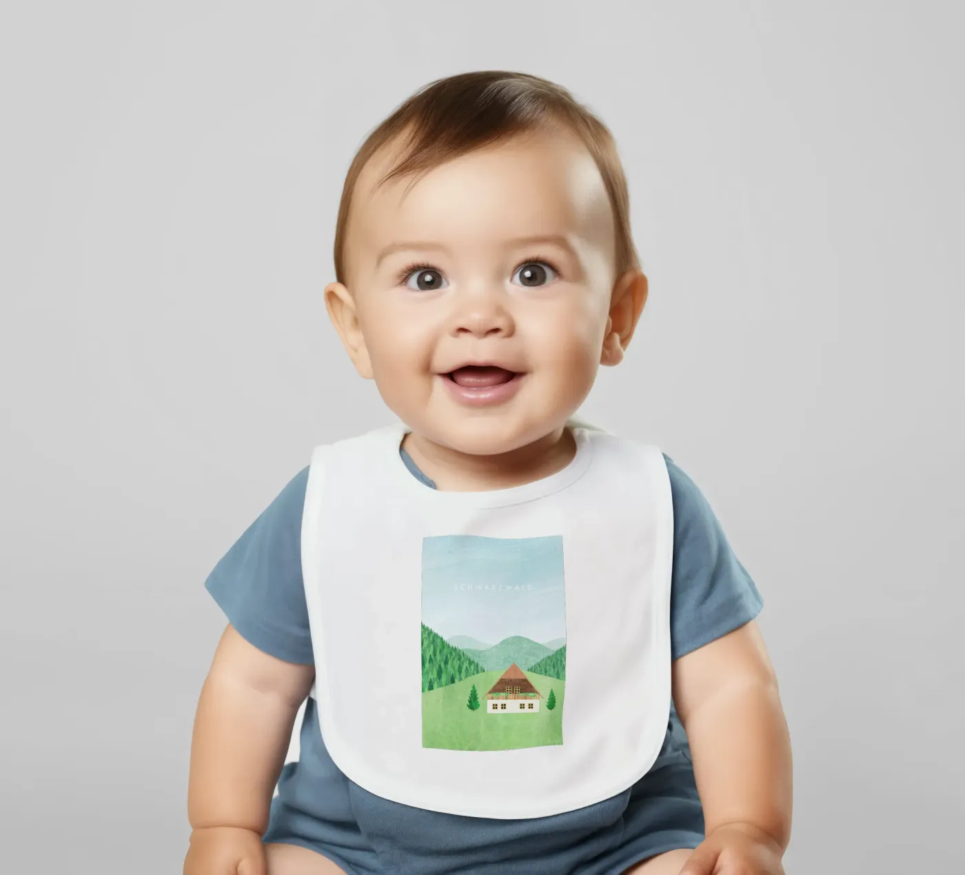 Schwarzwald baby bib by Henry Rivers