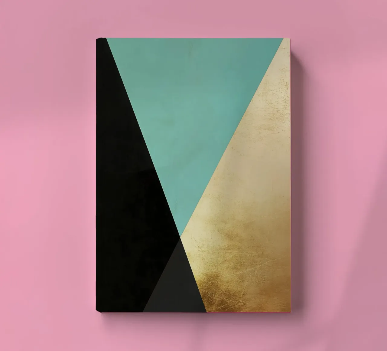 Minimalist background with gold foil and turquoise notebook by Niklas
