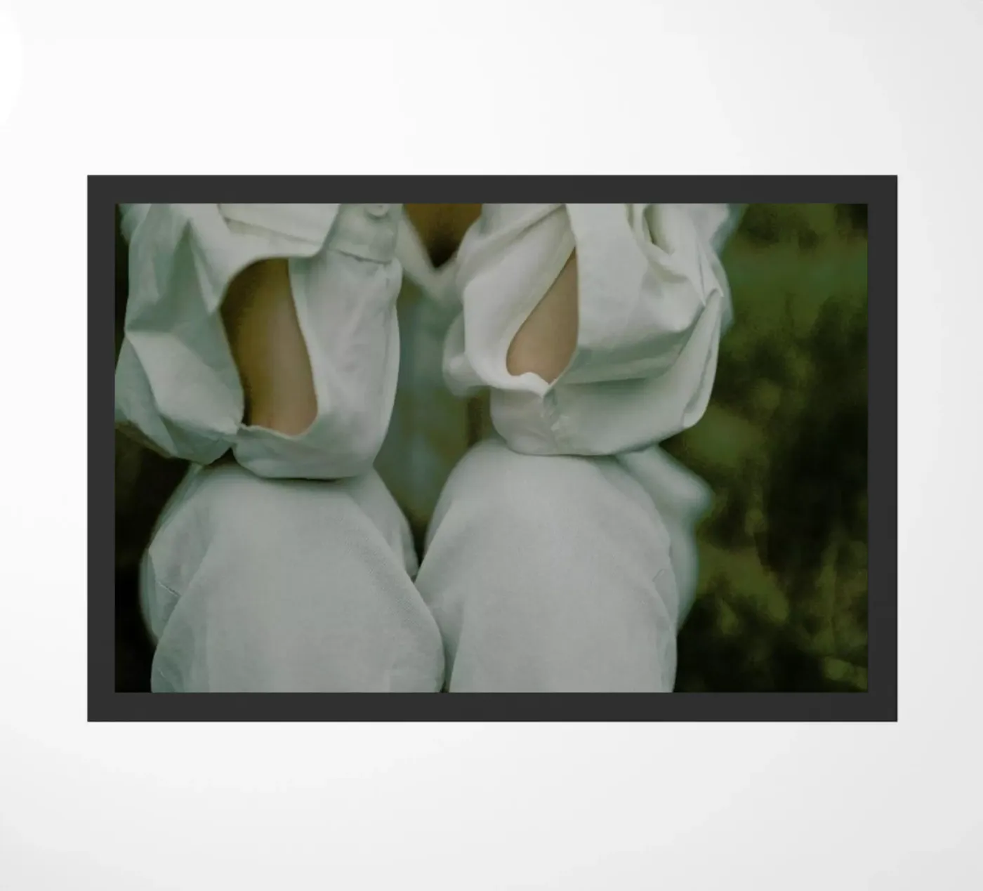 Buttons paillasson de Chris Abatzis