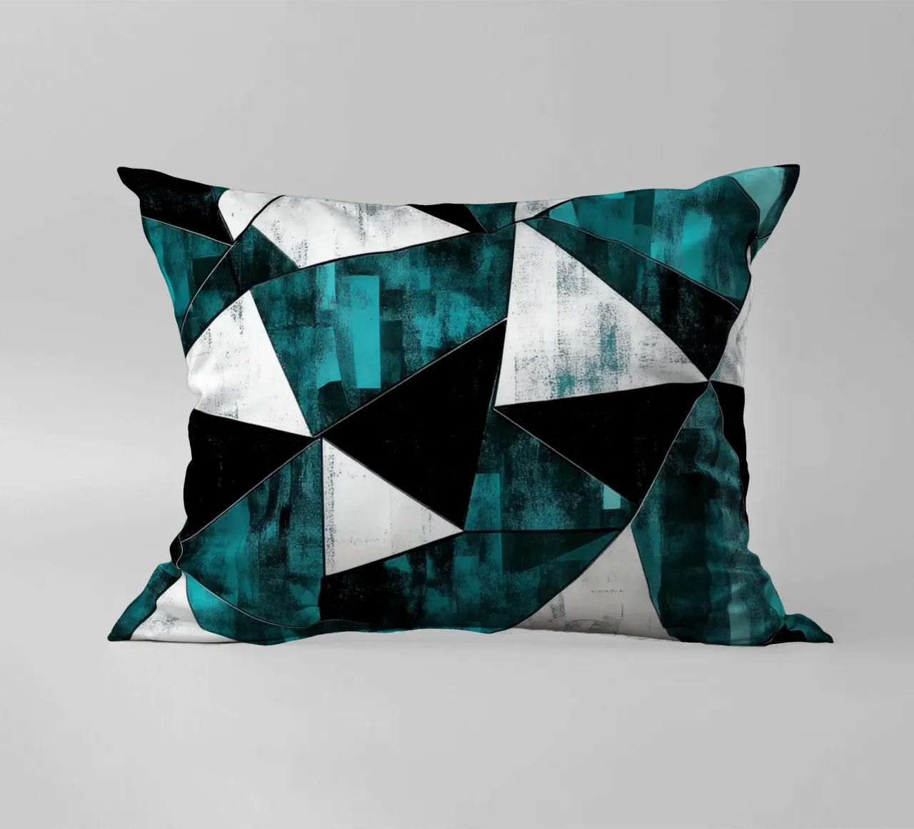 Triangular pattern in turquoise & white decorative cushion by Niklas