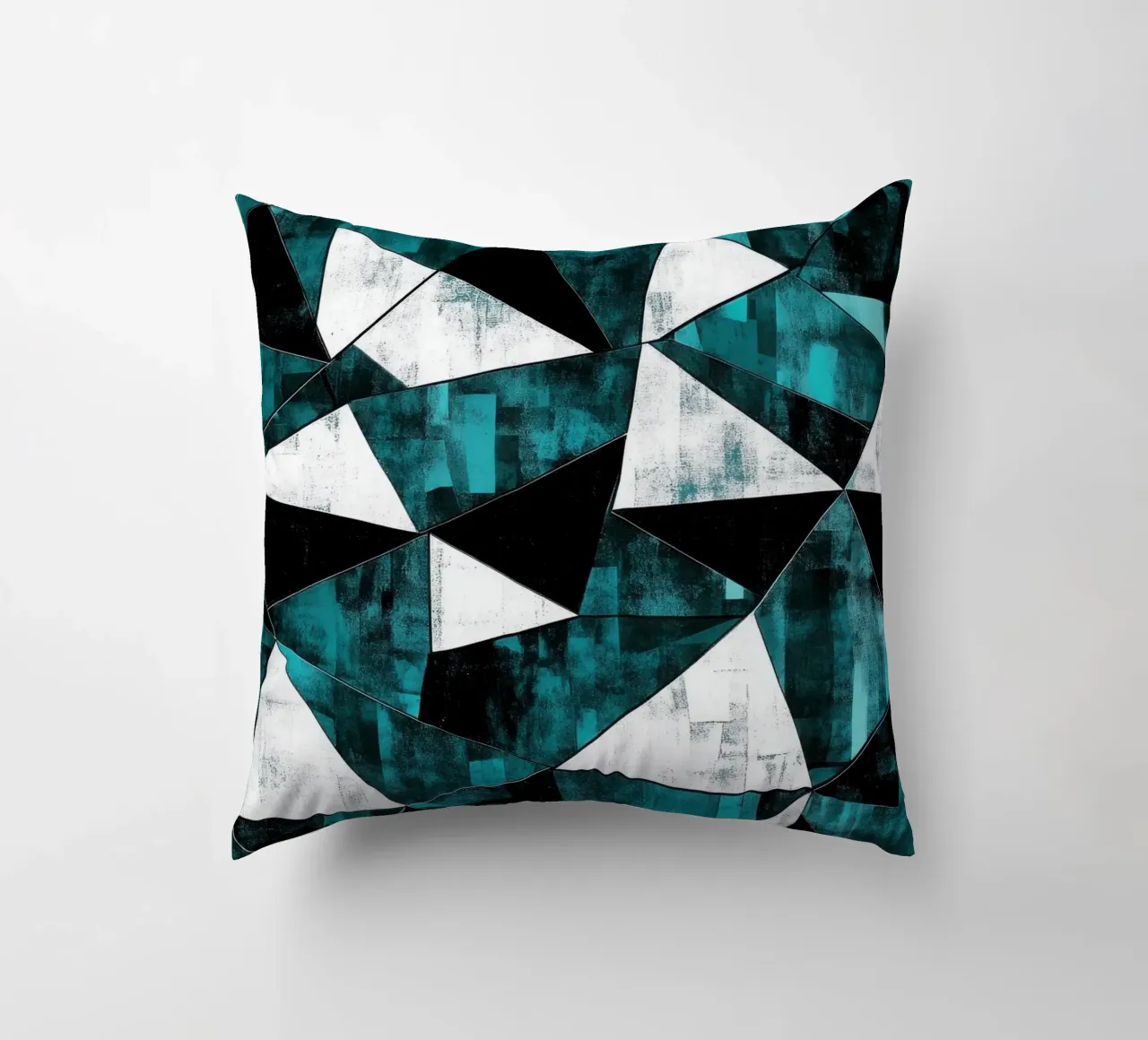 Triangular pattern in turquoise & white decorative cushion by Niklas