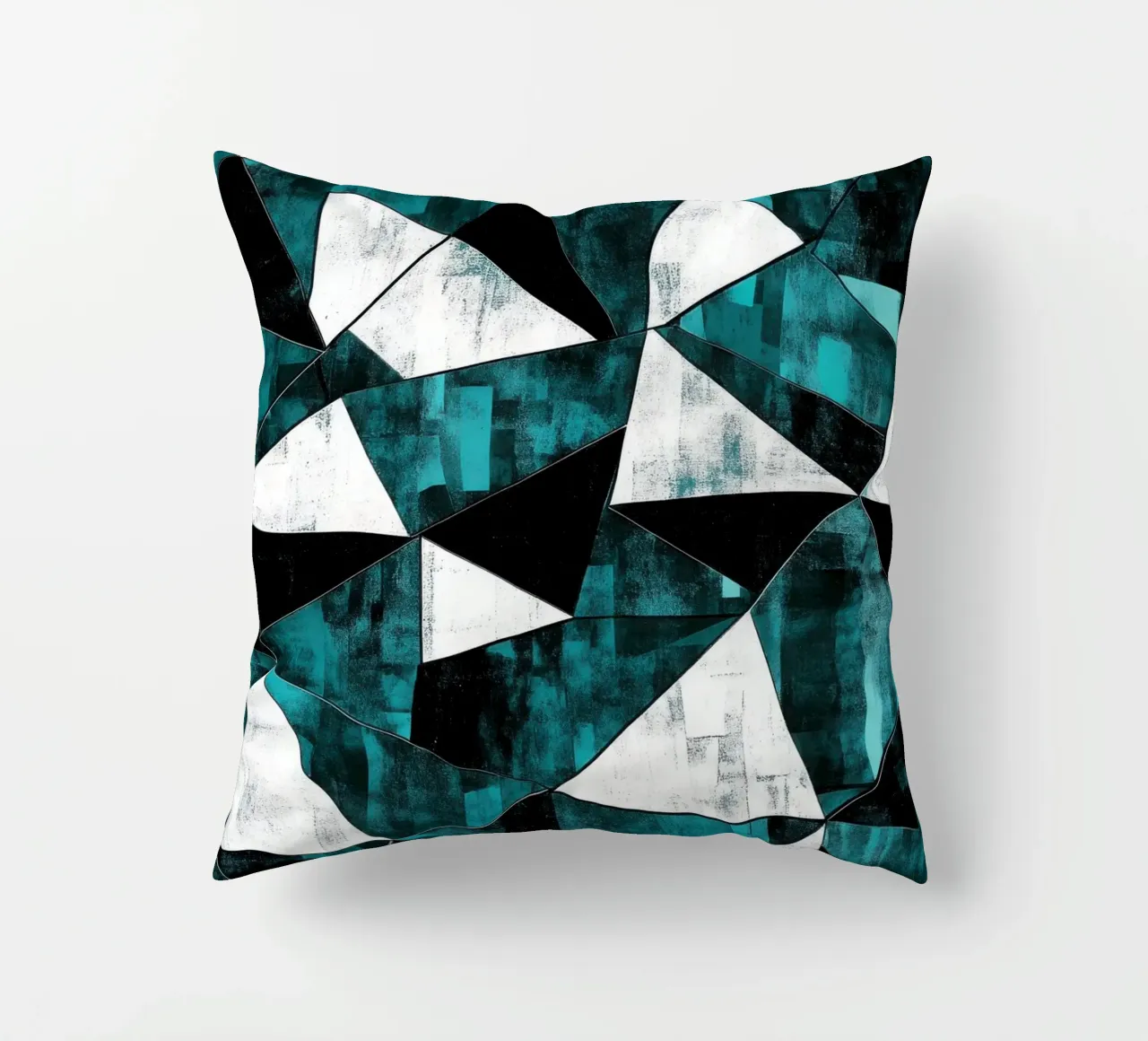 Triangular pattern in turquoise & white decorative cushion by Niklas