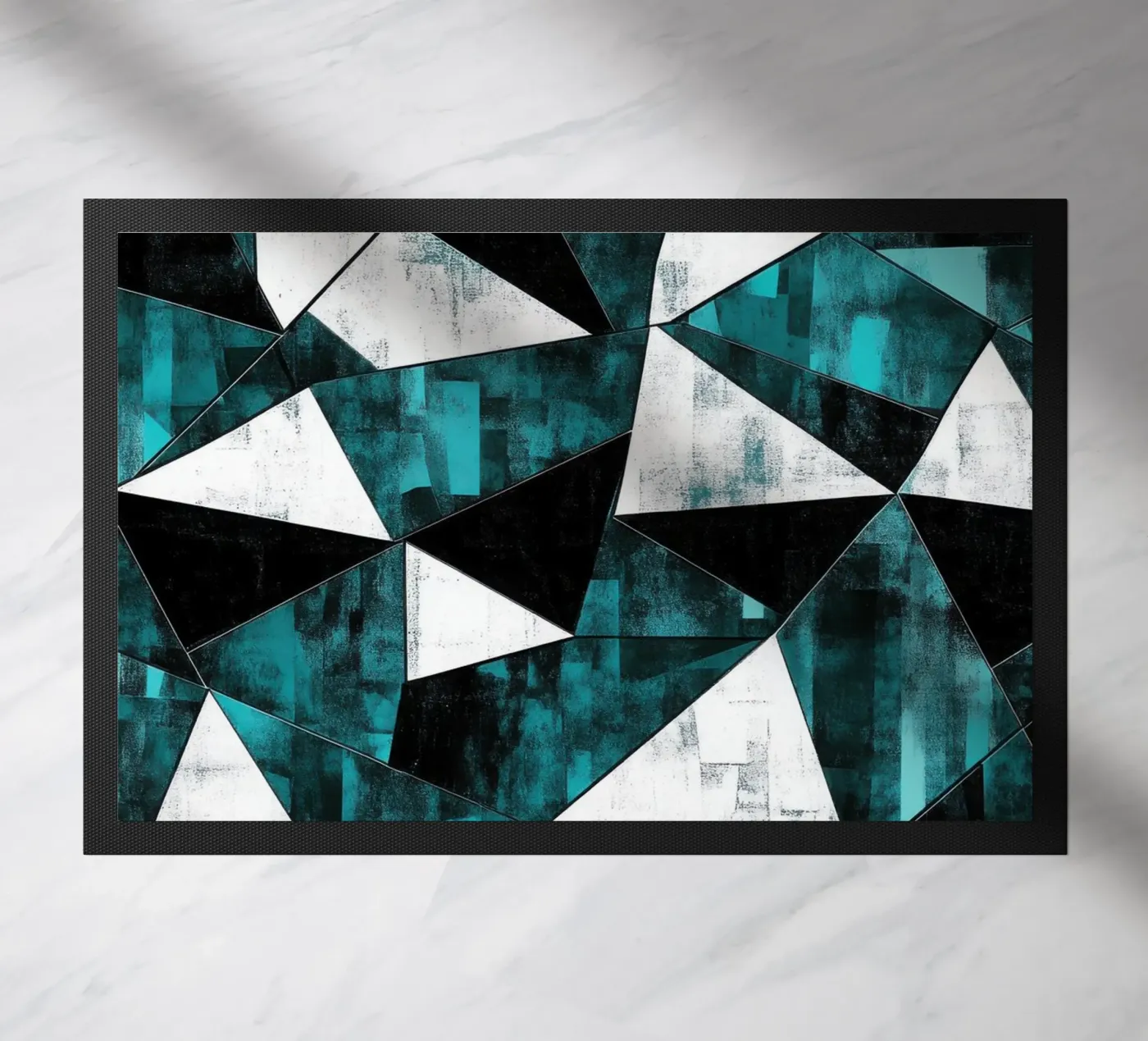 Triangular pattern in turquoise & white doormat by Niklas
