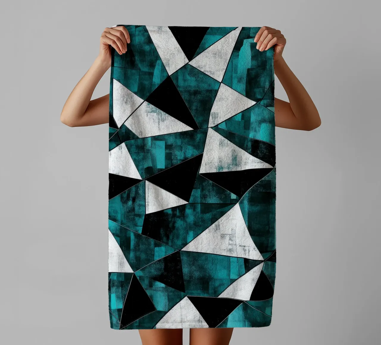 Triangular pattern in turquoise & white towel by Niklas