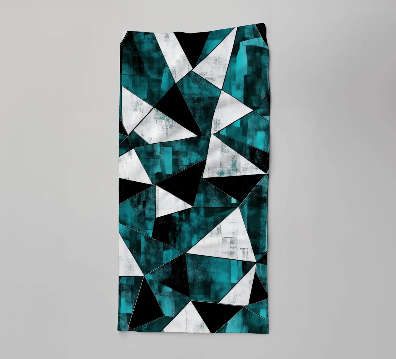 Triangular pattern in turquoise & white towel by Niklas