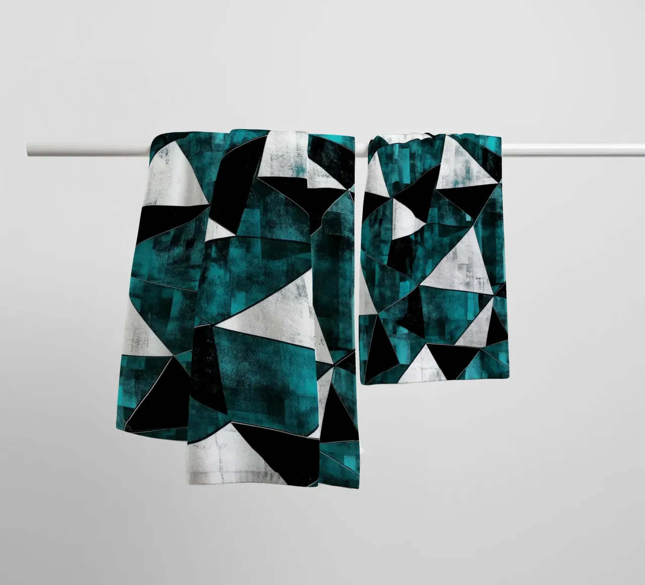 Triangular pattern in turquoise & white towel by Niklas