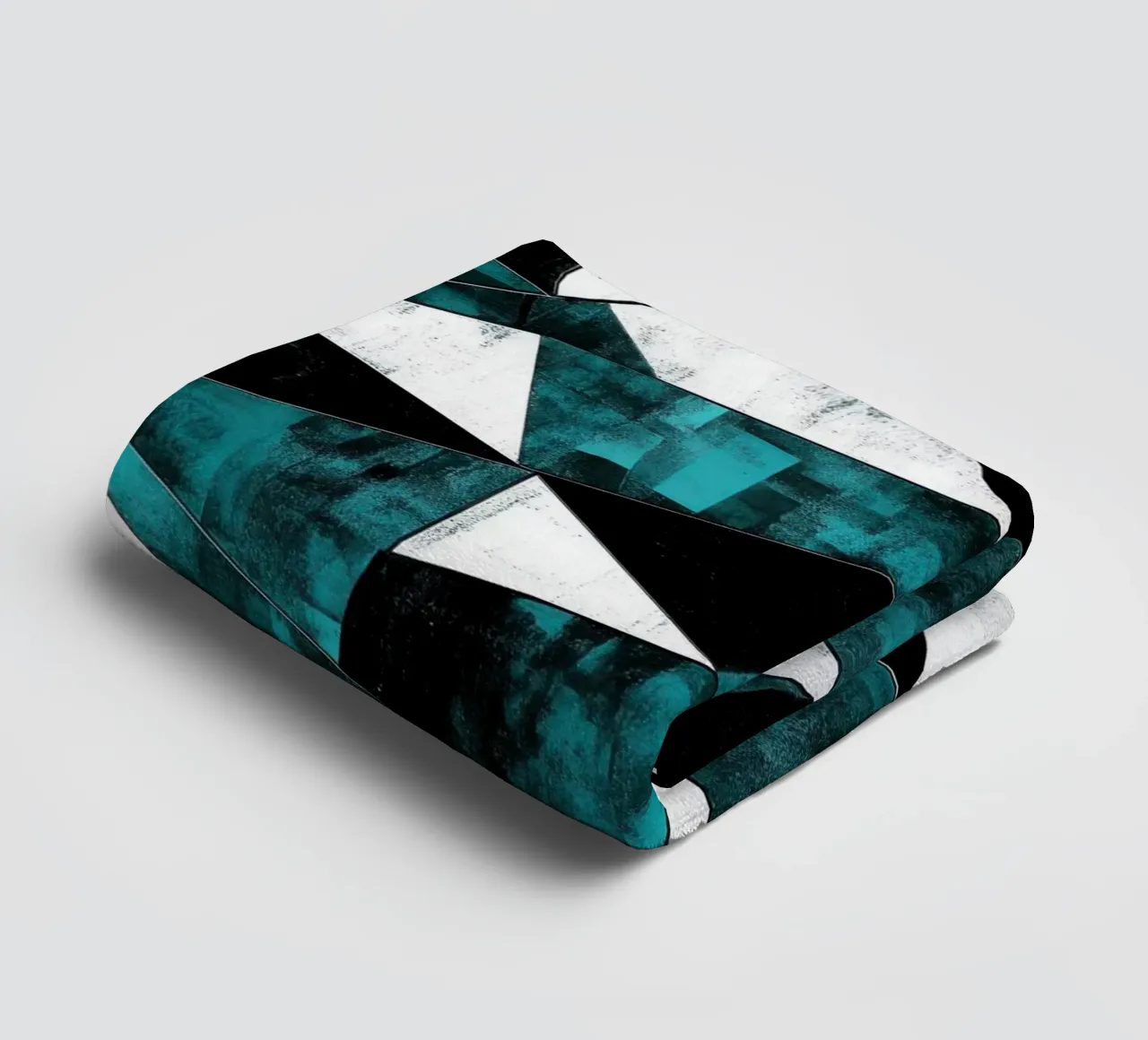 Triangular pattern in turquoise & white towel by Niklas