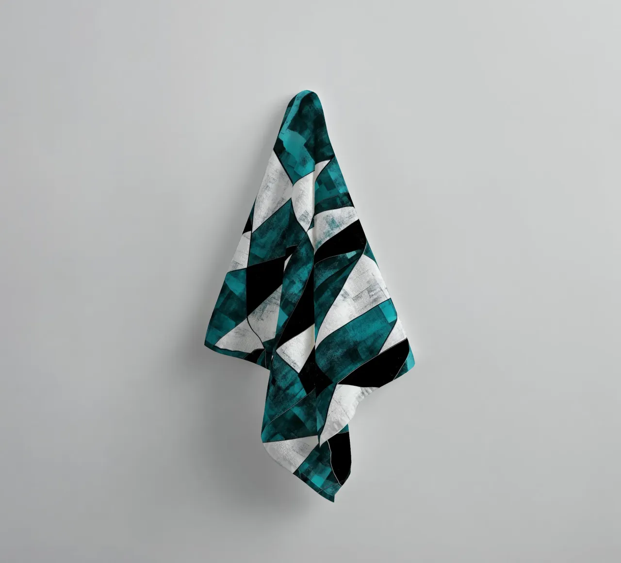 Triangular pattern in turquoise & white towel by Niklas