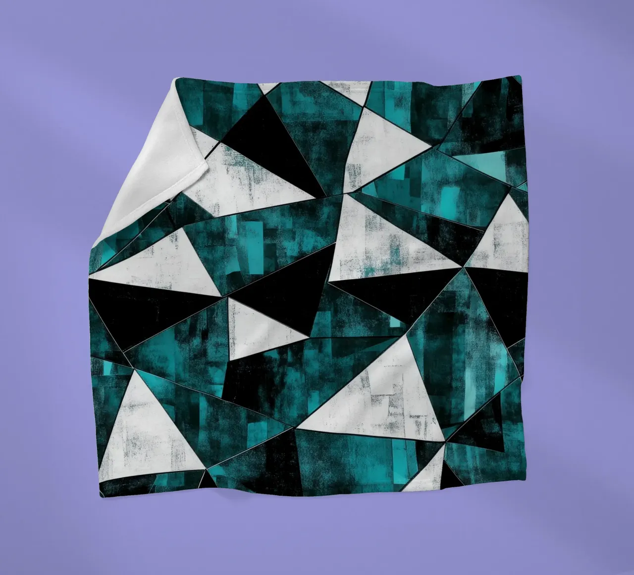 Triangular pattern in turquoise & white fleece blanket by Niklas