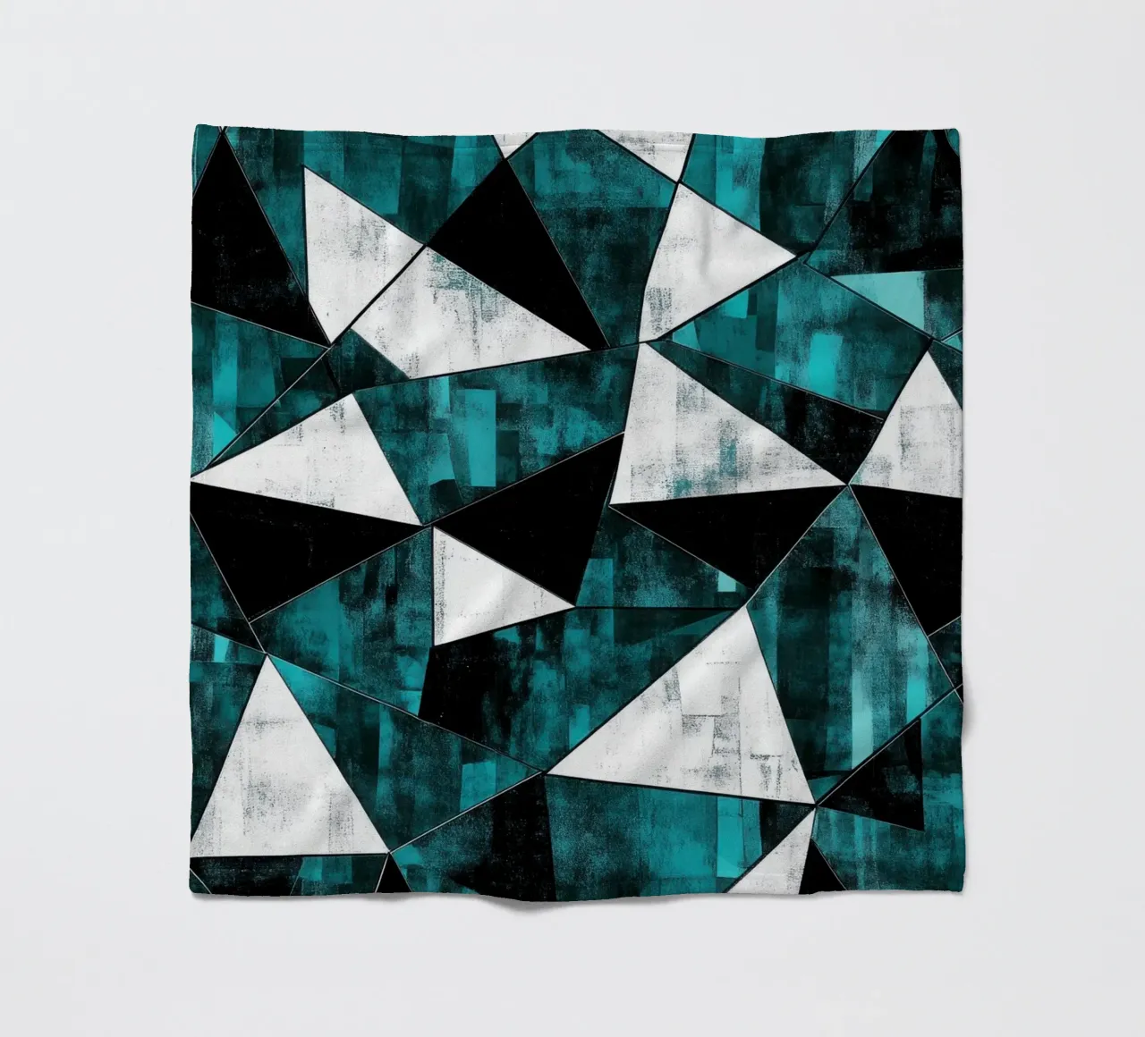Triangular pattern in turquoise & white fleece blanket by Niklas