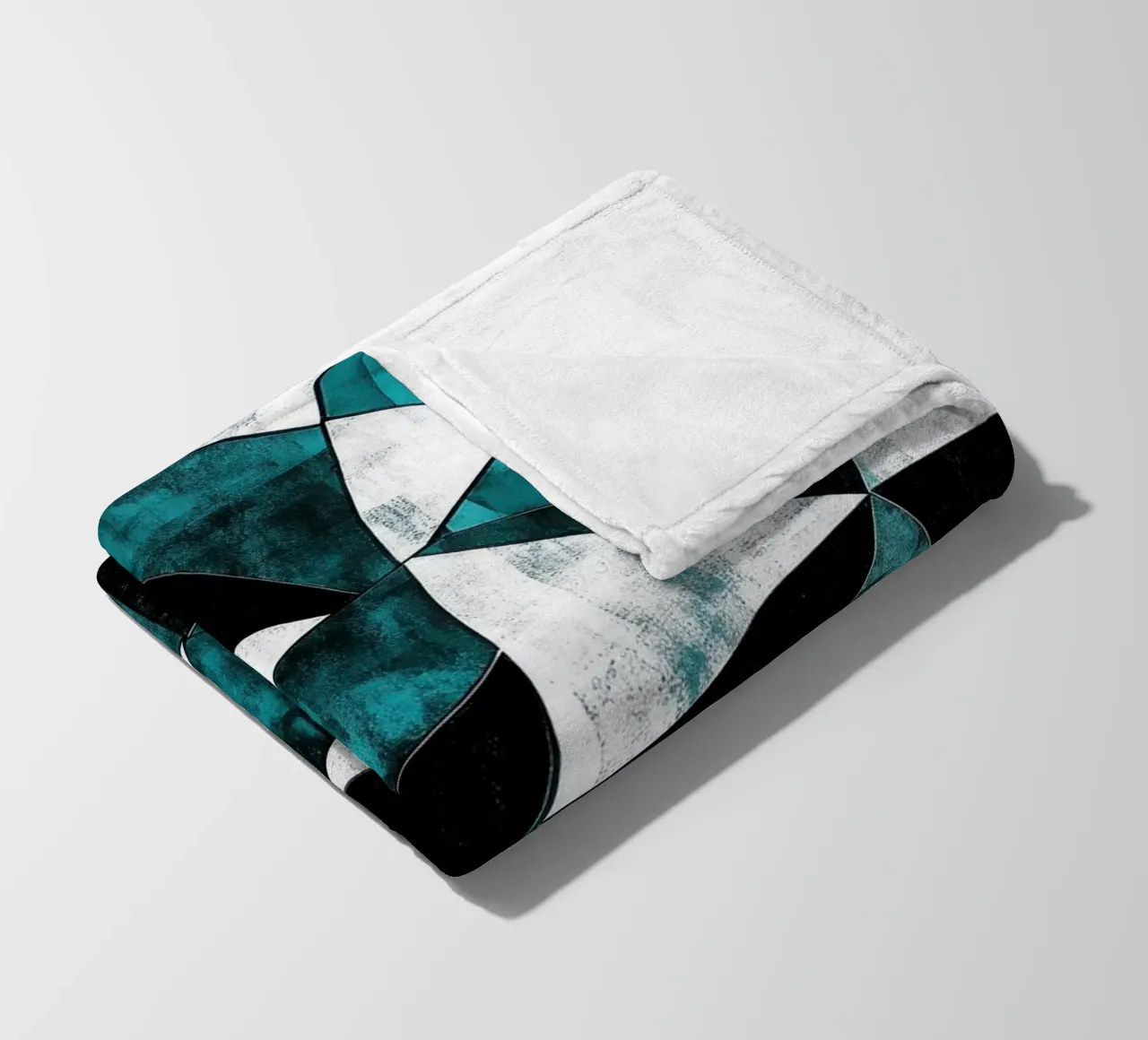 Triangular pattern in turquoise & white fleece blanket by Niklas