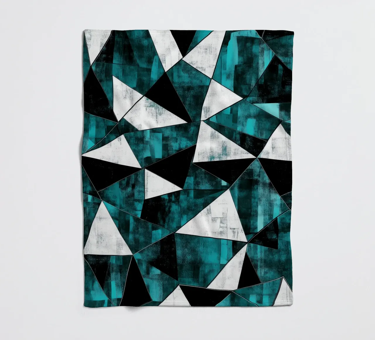 Triangular pattern in turquoise & white fleece blanket by Niklas