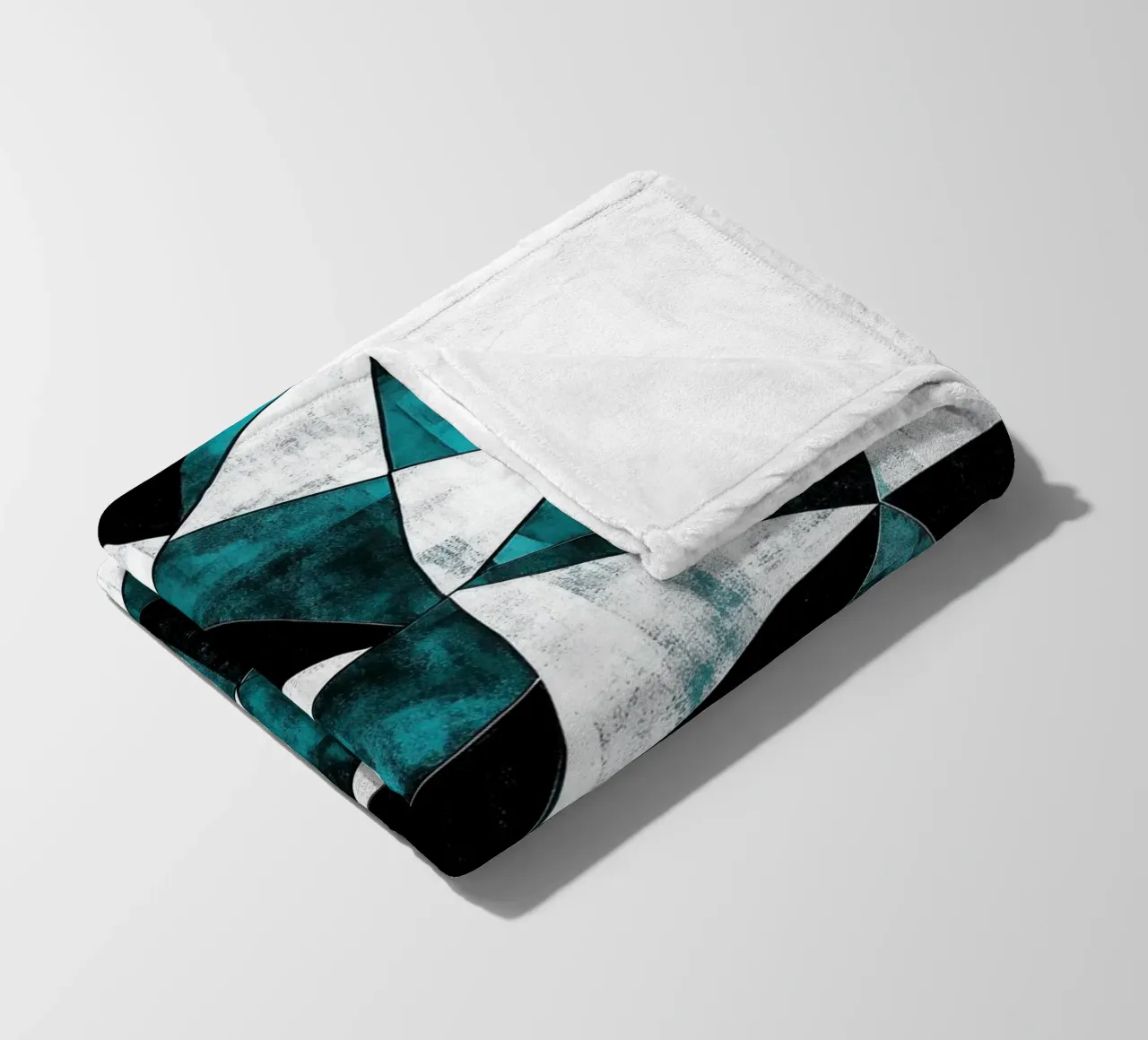 Triangular pattern in turquoise & white fleece blanket by Niklas