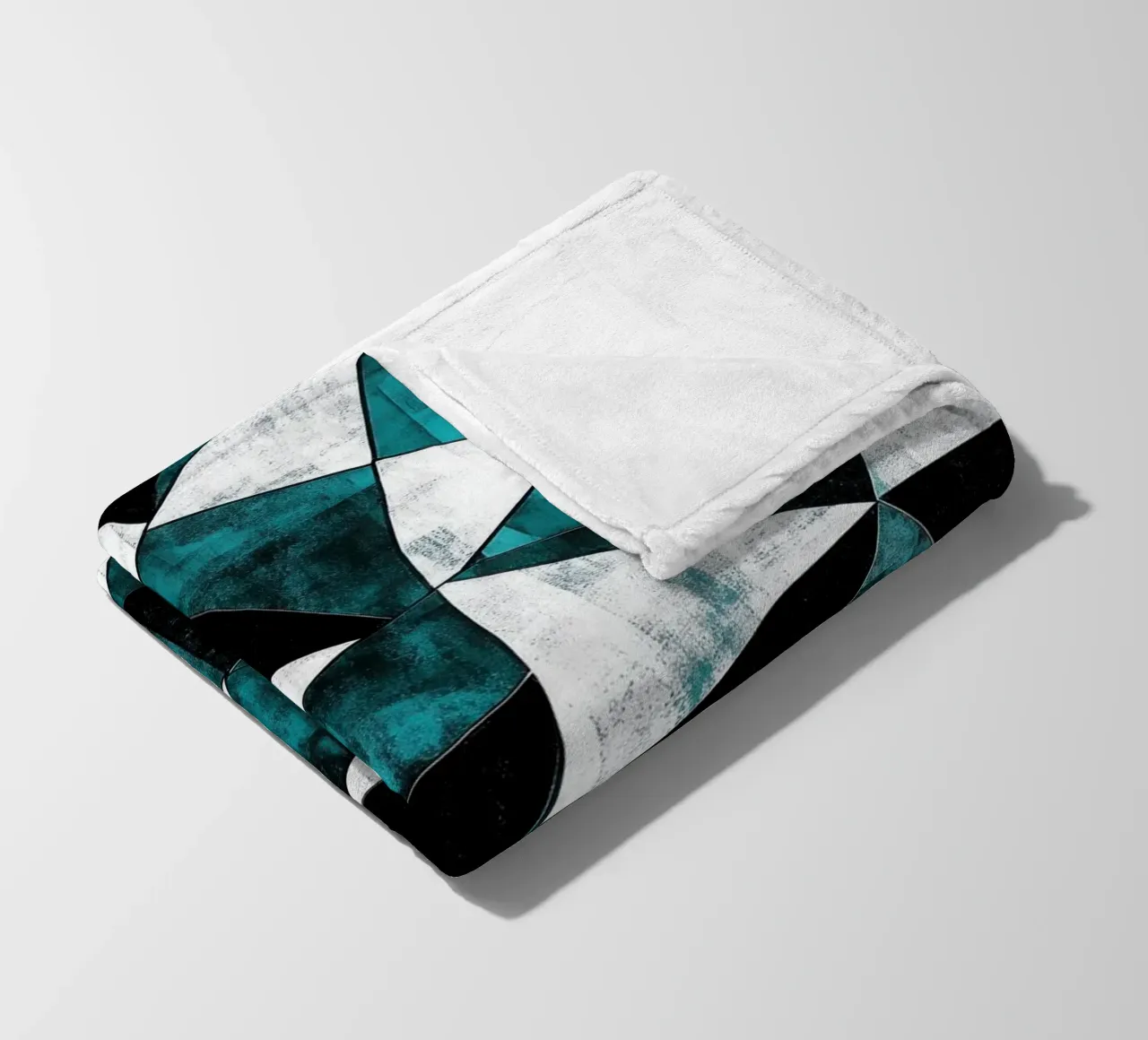 Triangular pattern in turquoise & white fleece blanket by Niklas