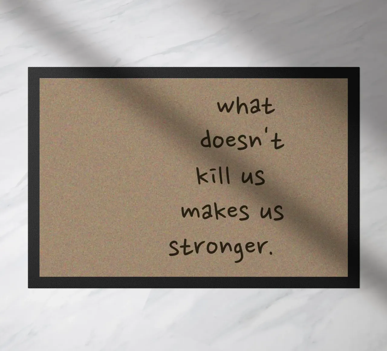 "What Doesn't Kill Us..." - Motivational Text Art Print doormat by ClubArt