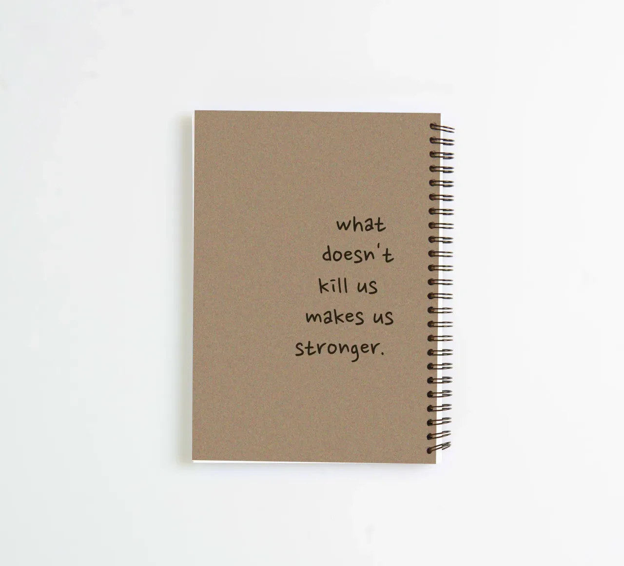 "What Doesn't Kill Us..." - Motivational Text Art Print spiral notebook by ClubArt