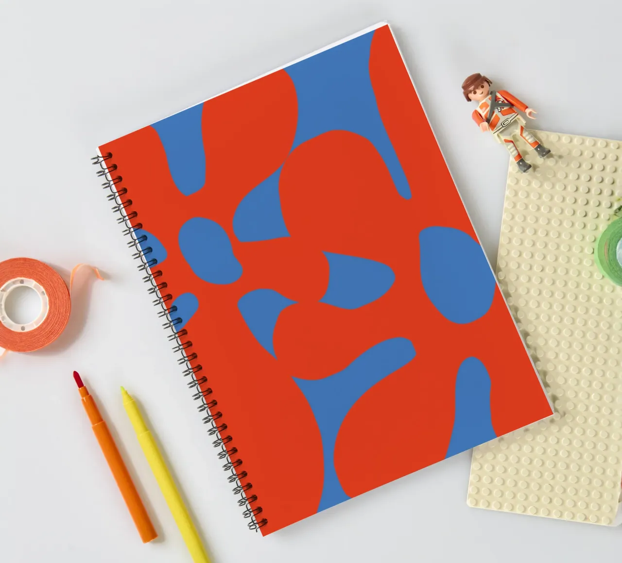 Abstract Retro Flower Design in Bold Red and Blue Tones spiral notebook by pdigitalprints