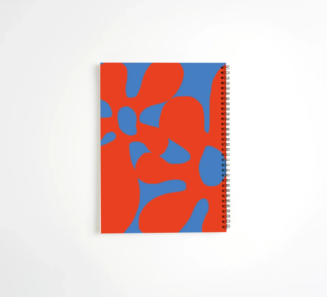 Abstract Retro Flower Design in Bold Red and Blue Tones spiral notebook by pdigitalprints