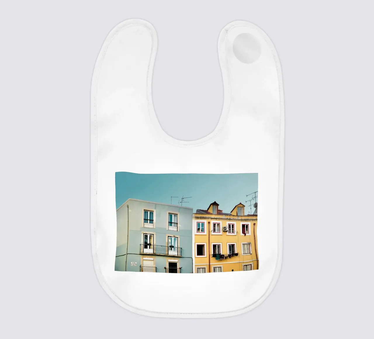 Lisbon Apartments baby bib by KISSA STUDIO